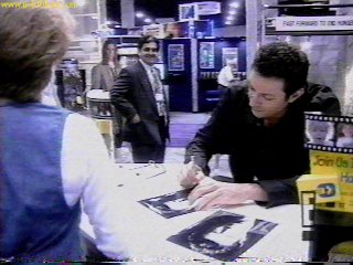 Jeff signing photos at a sci-fi convention