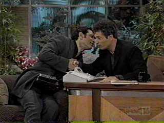 Jeff gives Howie a kiss