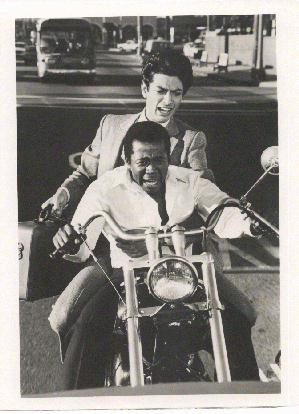 Tenspeed and Brownshoe on a motorbike